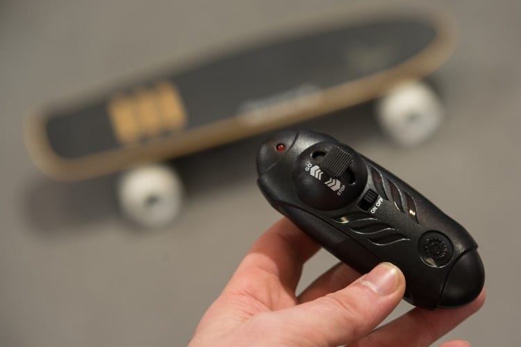 Holding Electric Skateboard Controller