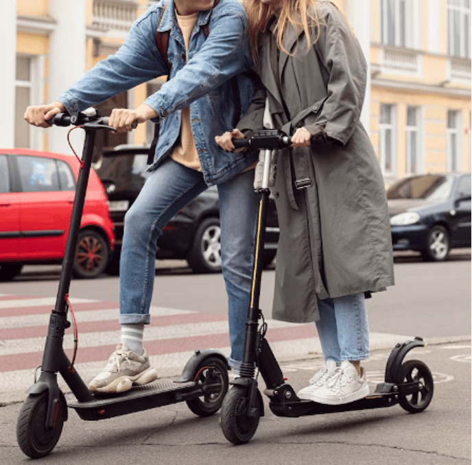 riding electric scooters in town